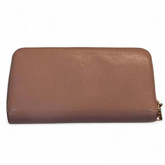 Vintage Authentic Miu Miu Blush Pink Leather Zip Wallet signature bow and gold.
